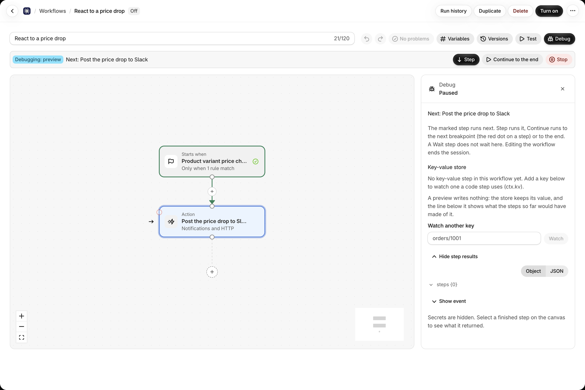 A debug session: the bar reads Debugging preview, Next Post the price drop to Slack, with Step, Continue to the end and Stop; the trigger is green, an arrow marks the next step and the panel says Paused