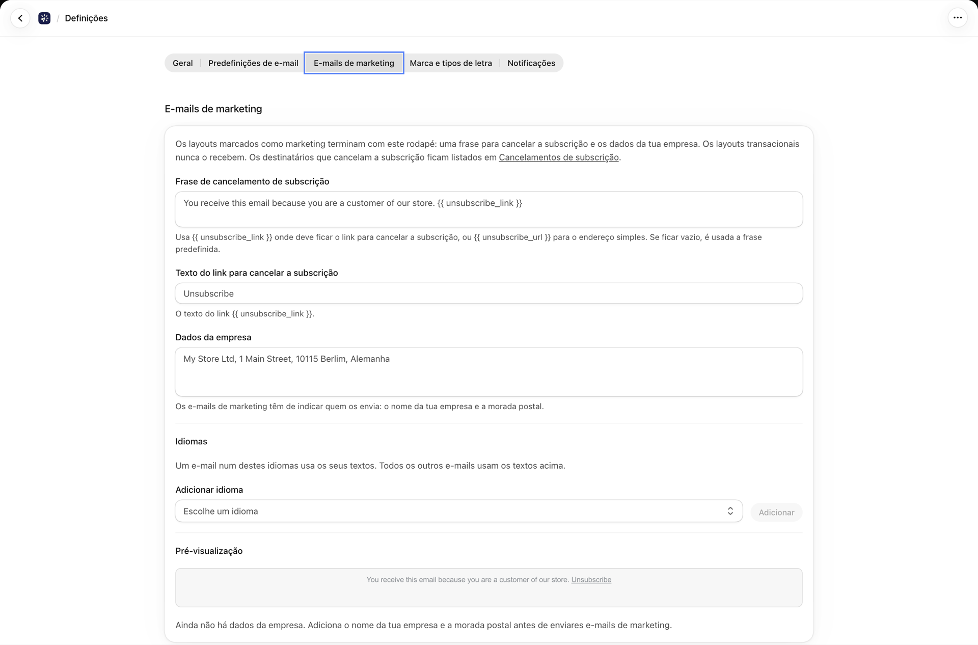 O separador «E-mails de marketing», com a frase de cancelamento da subscrição, o texto do link e os dados da empresa